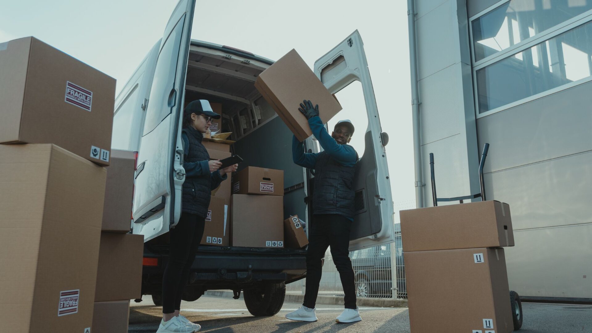 Cargo van workers unload van