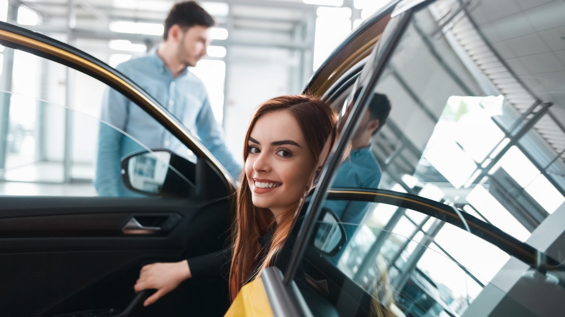 professional woman stepping out of car